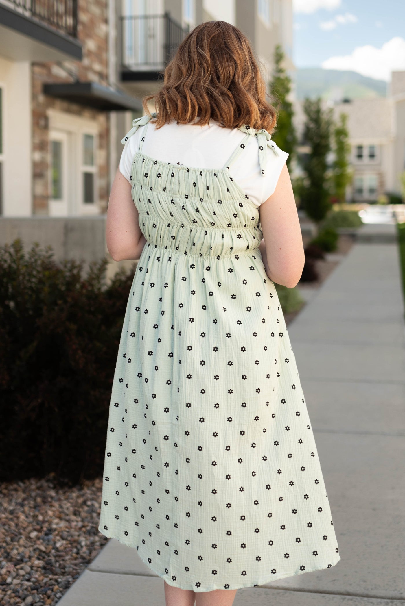 Back view of a mint dress sundress
