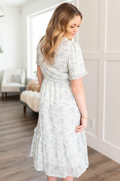 Side view of the blue ivory floral dress