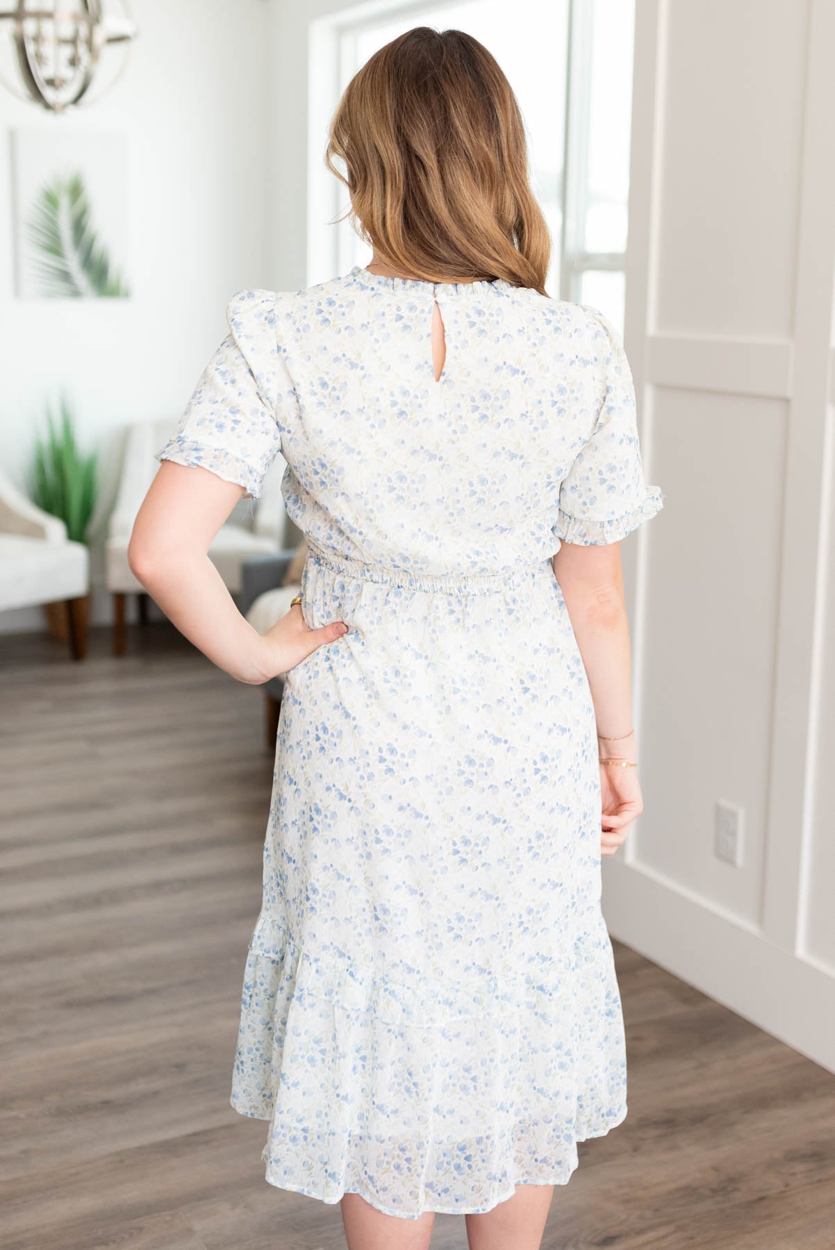 Back view of the blue ivory floral dress