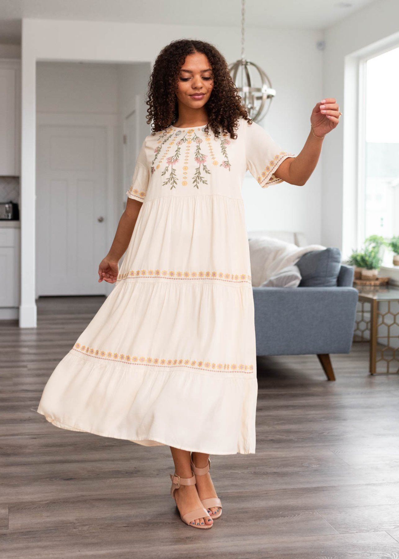 Cream dress with embroidery on the top