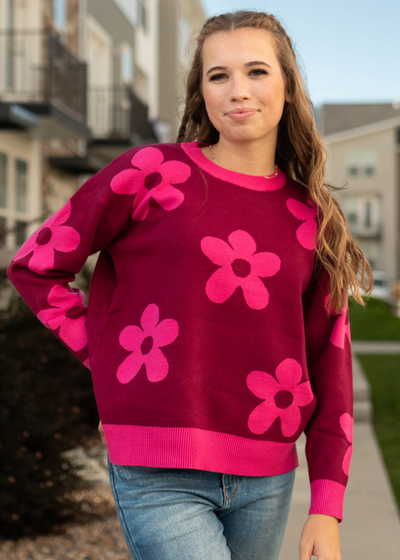 Raspberry sweater with flower print