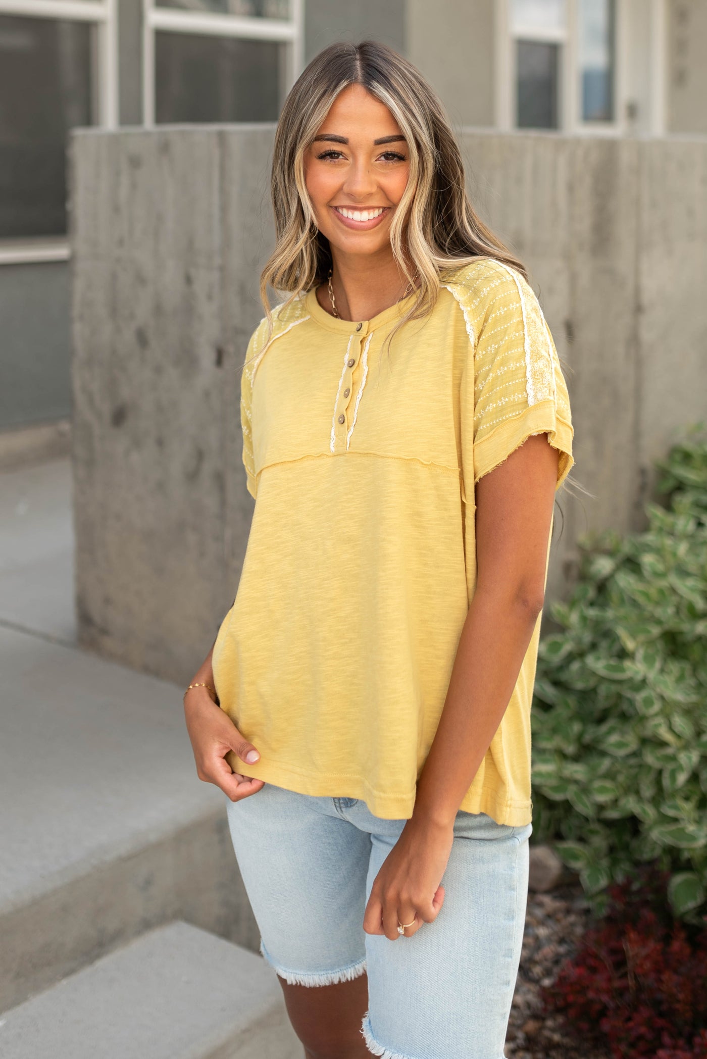 Short sleeve marigold top with buttons