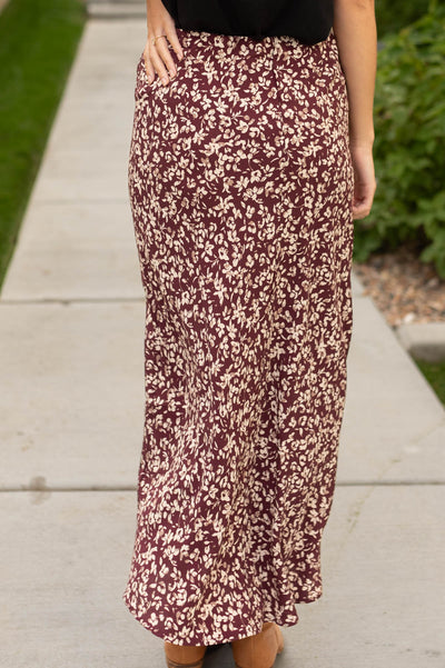 Back view of a merlot floral skirt