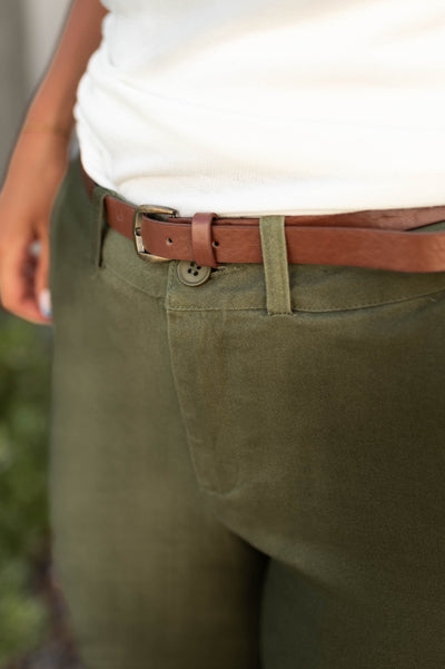 The waist of olive pants