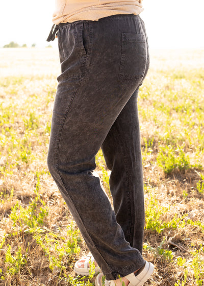 Side view of plus size black pants