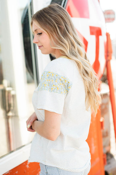 Flower pattern on white stripe top