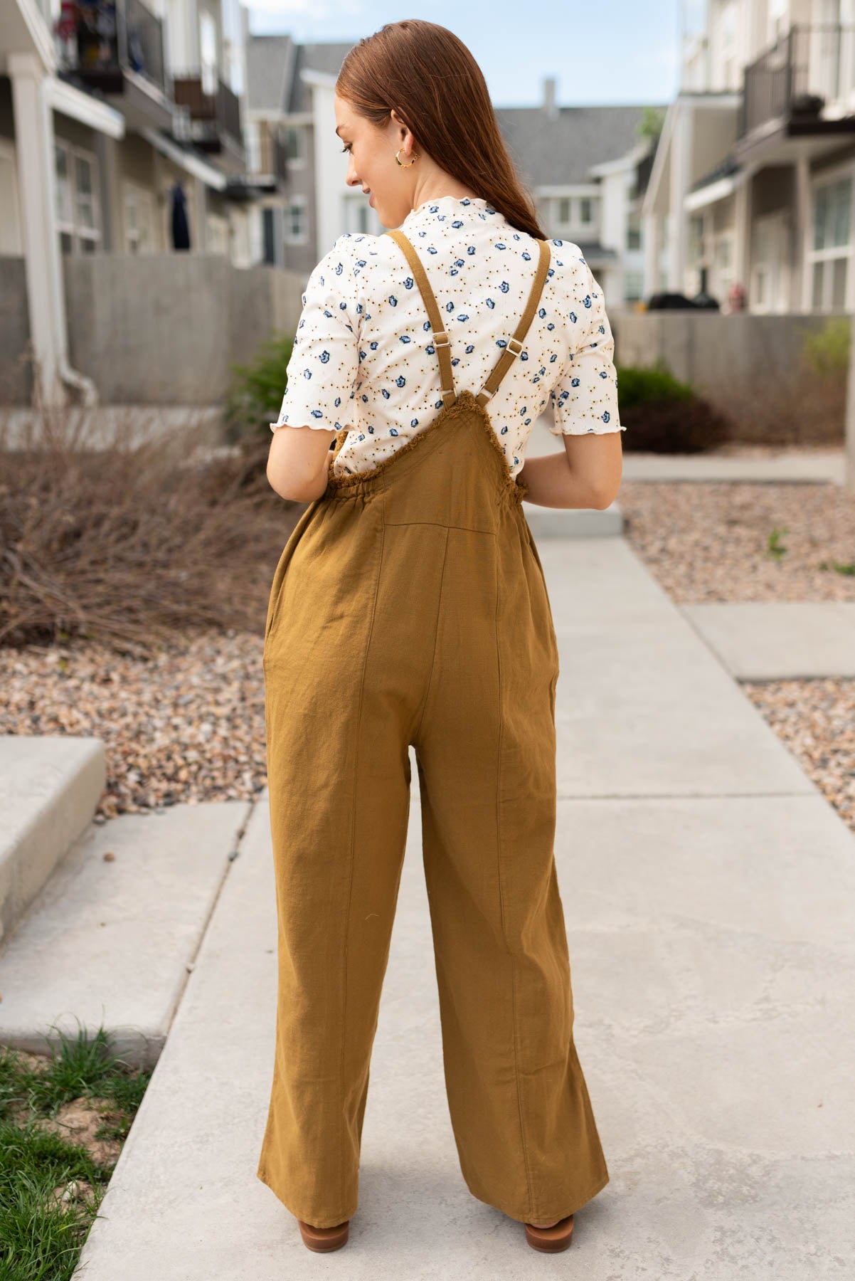 Back view of the dark mustard washed jumpsuit