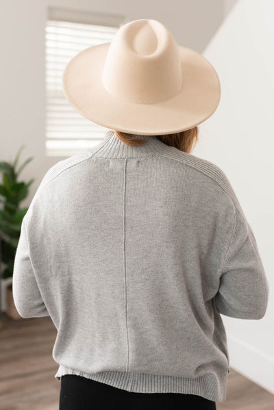 Back view of the heather grey sweater