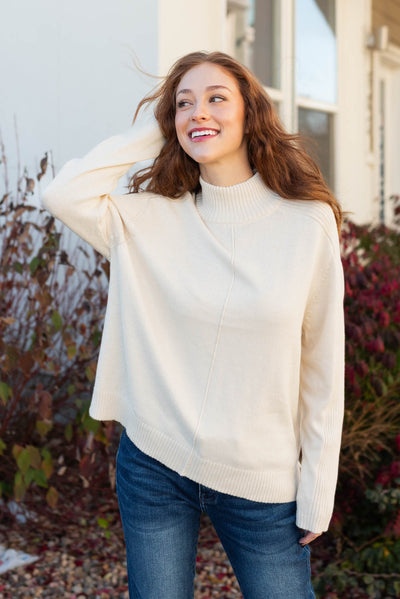 Mock turtle neck ivory sweater with long sleeves