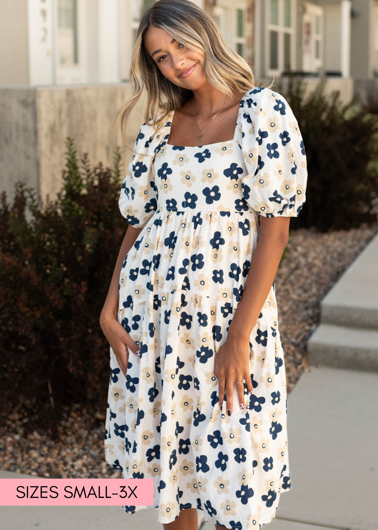 Cream floral dress with a square neck and short sleeves