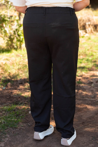 Back view of plus size black pants