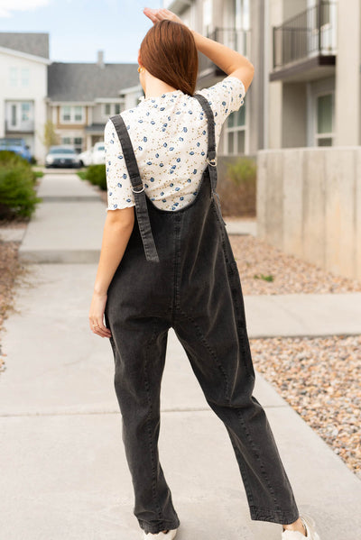 Back view of the adjustable straps on the charcoal washed jumpsuit