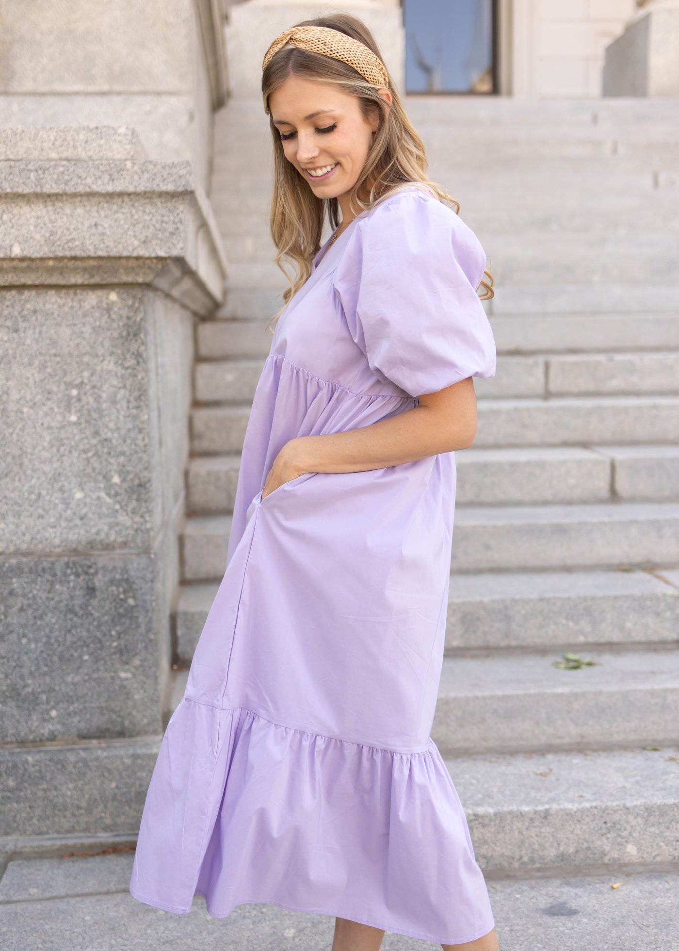 Side view of a short sleeve lavender dress
