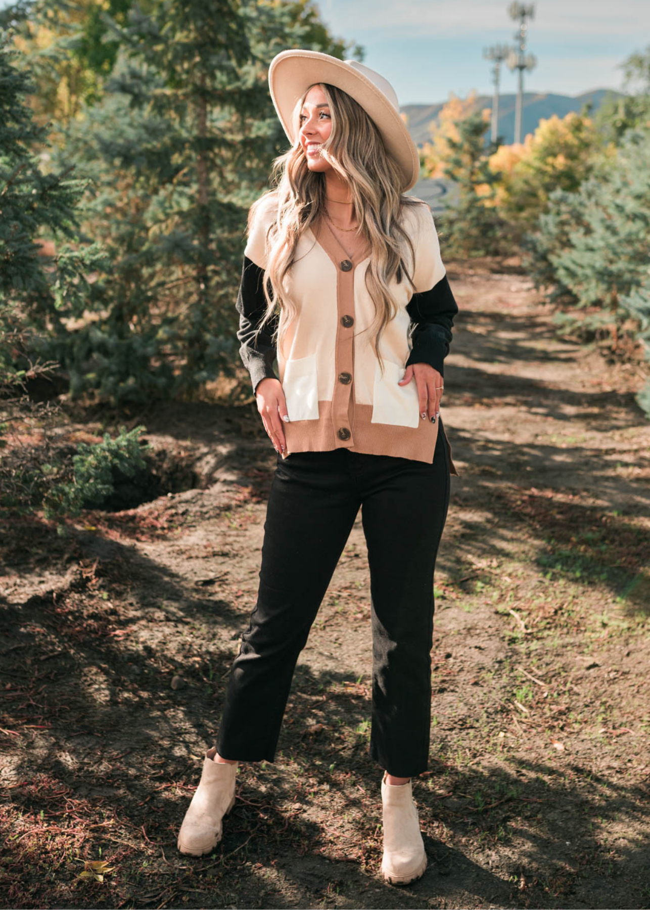 Color block light taupe cardigan with long black sleeves
