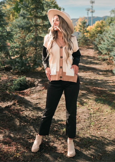 Color block light taupe cardigan with long black sleeves