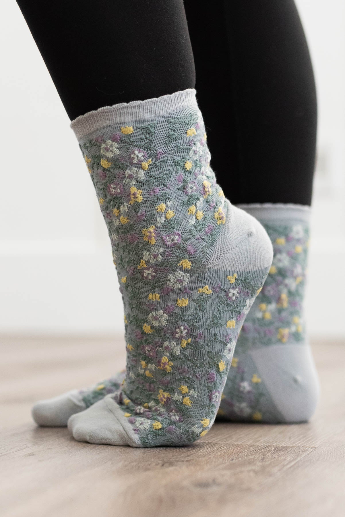 Side view of the grey floral socks