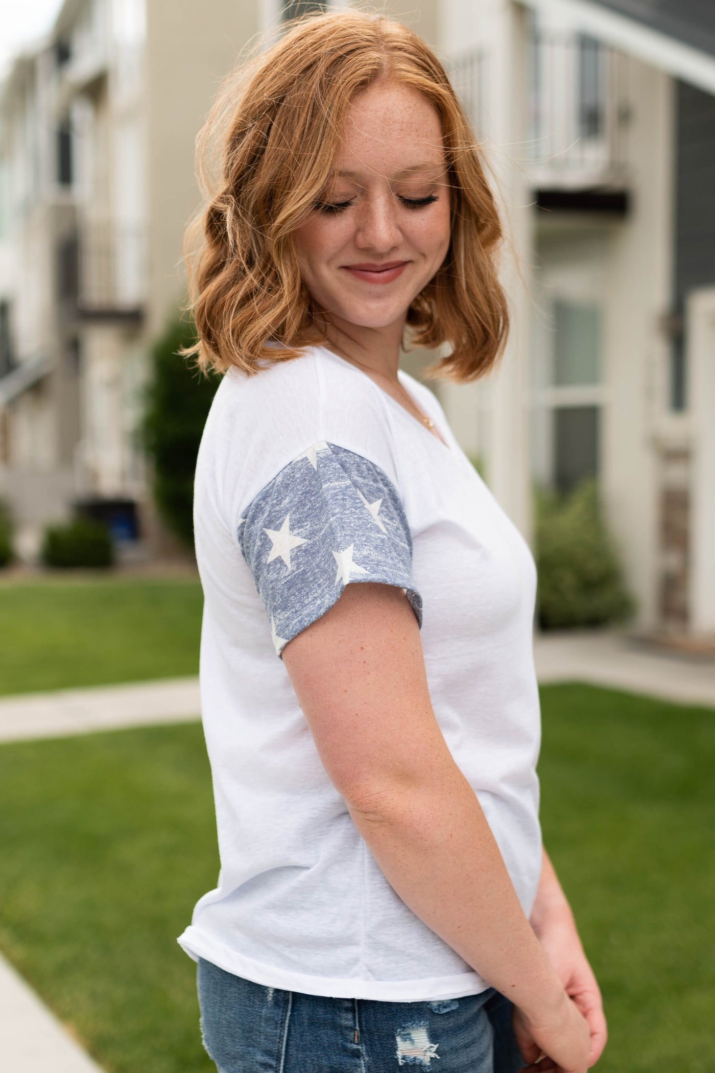 Short sleeve white top with stars on sleeve