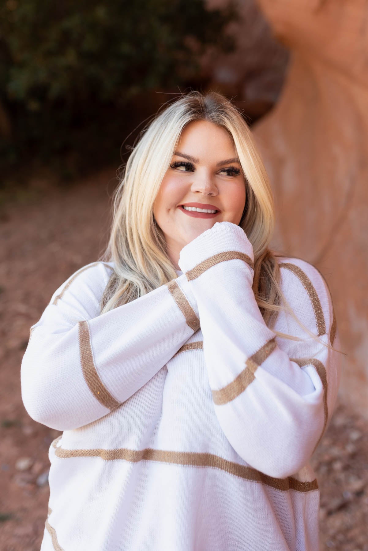 Plus size white sweater with drop sleeves