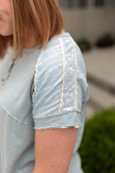 French blue top with patchwork fabric and lace trim
