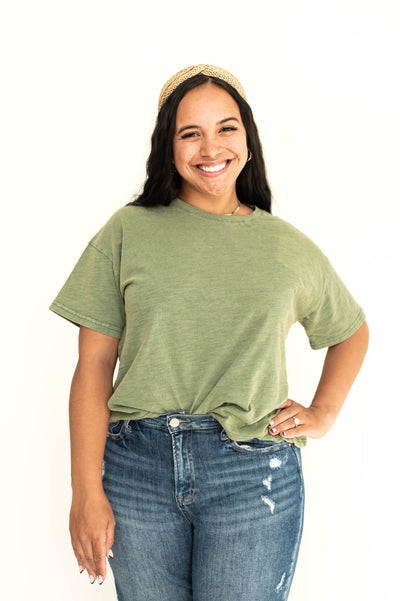 Front view of a bright sage top