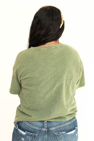 Back view of a bright sage t-shirt.