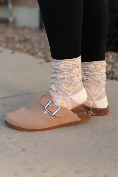 Side view of nude clogs