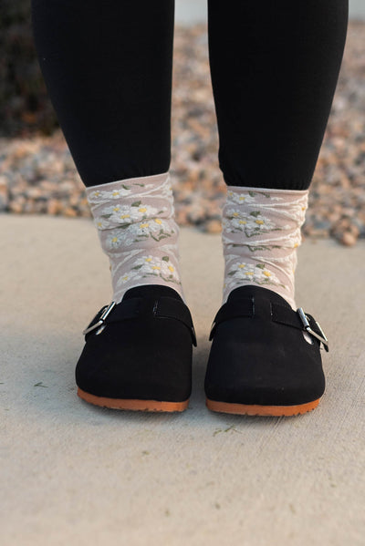 Front view of black clogs