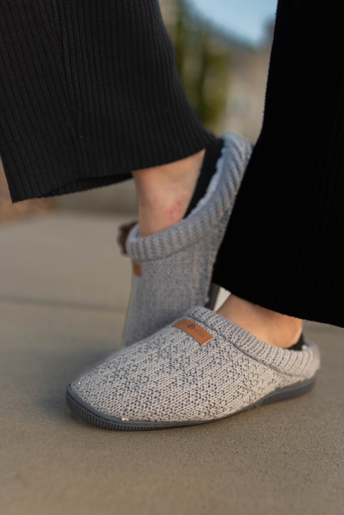 Grey knitted slippers