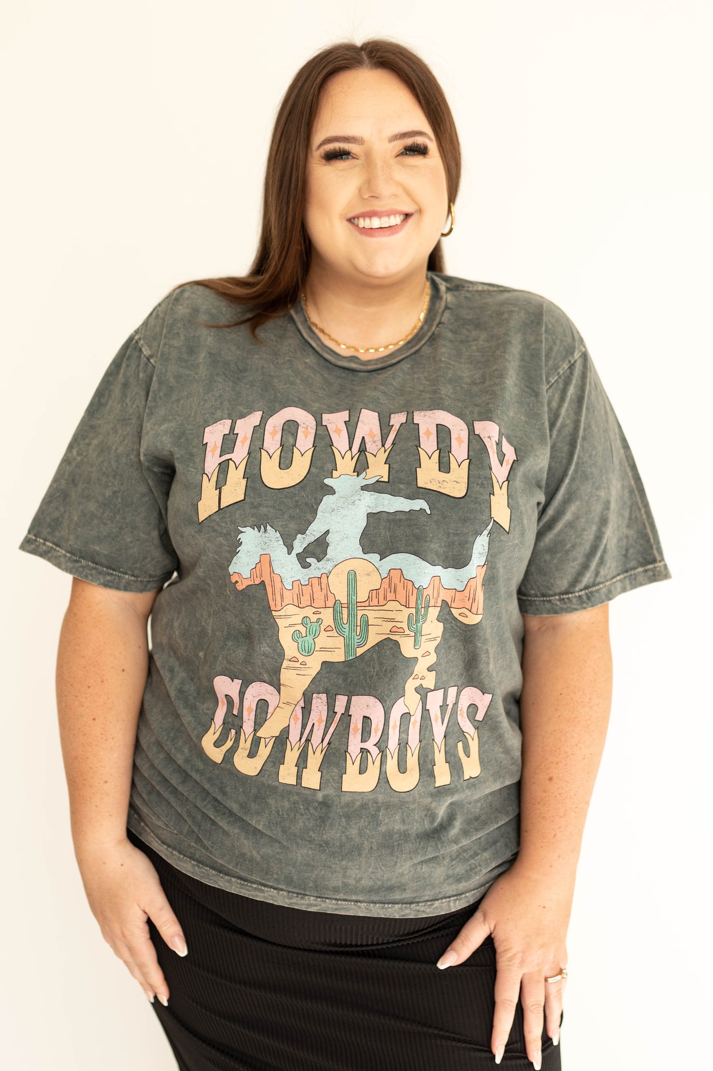 Front view of a blue gray cowboy graphic t-shirt .
