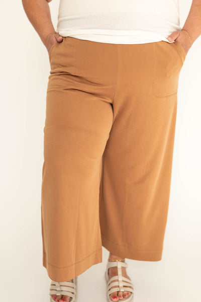 Front view of a mocha wide leg knit pants.