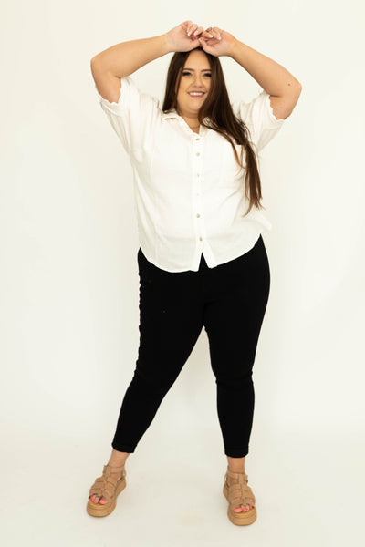 Front view of plus size black skinny jeans