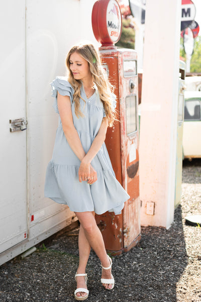 Blue dress with ruffles on sleeves