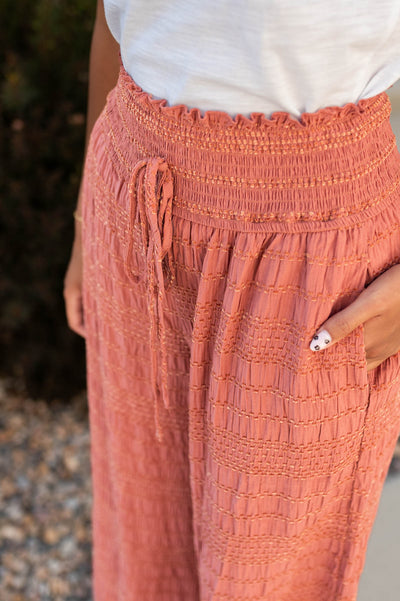 High waisted rust pants with pockets