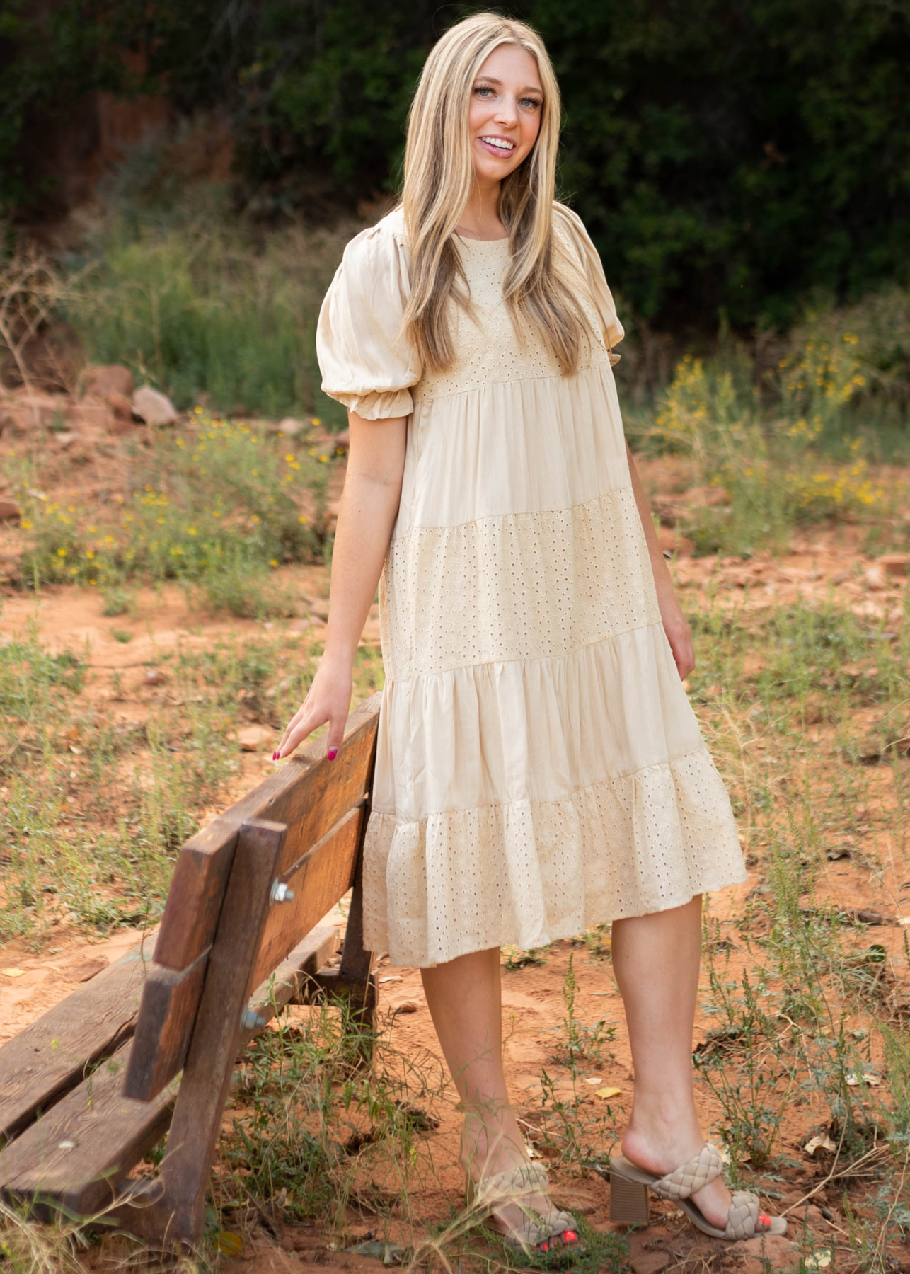 Short sleeve beige dress with tiered design and eyelet fabric panels