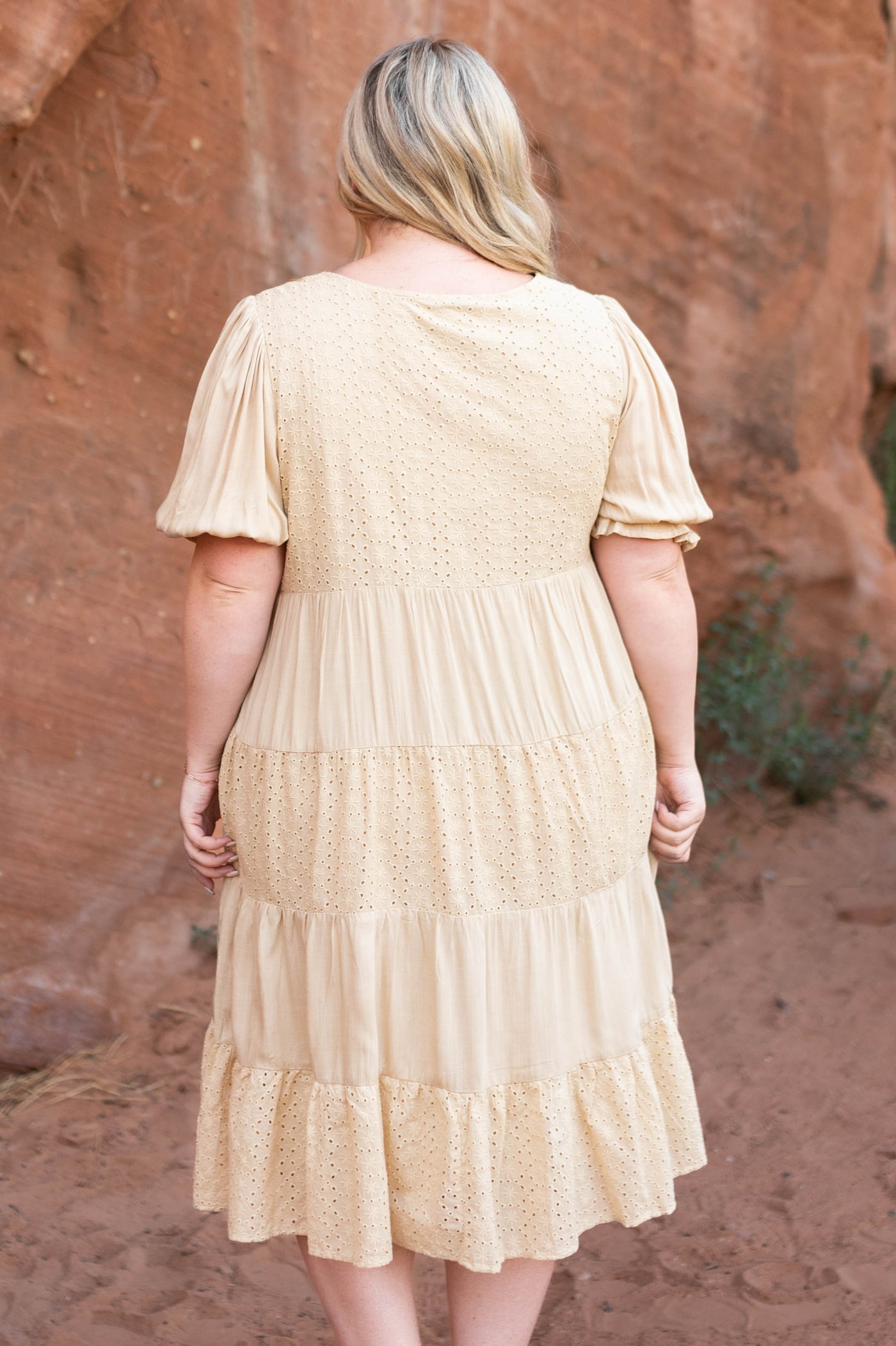 Back view of a beige dress