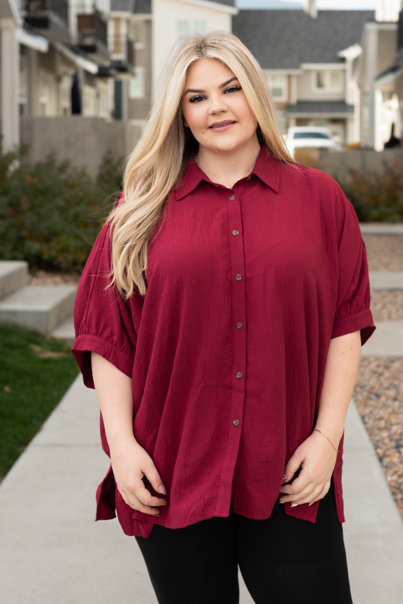 Front view of a short sleeve plus size burgundy button down