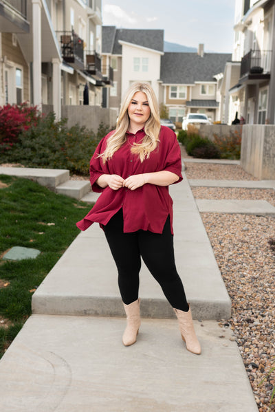 Plus size burgundy button down with short sleeves and a collar 