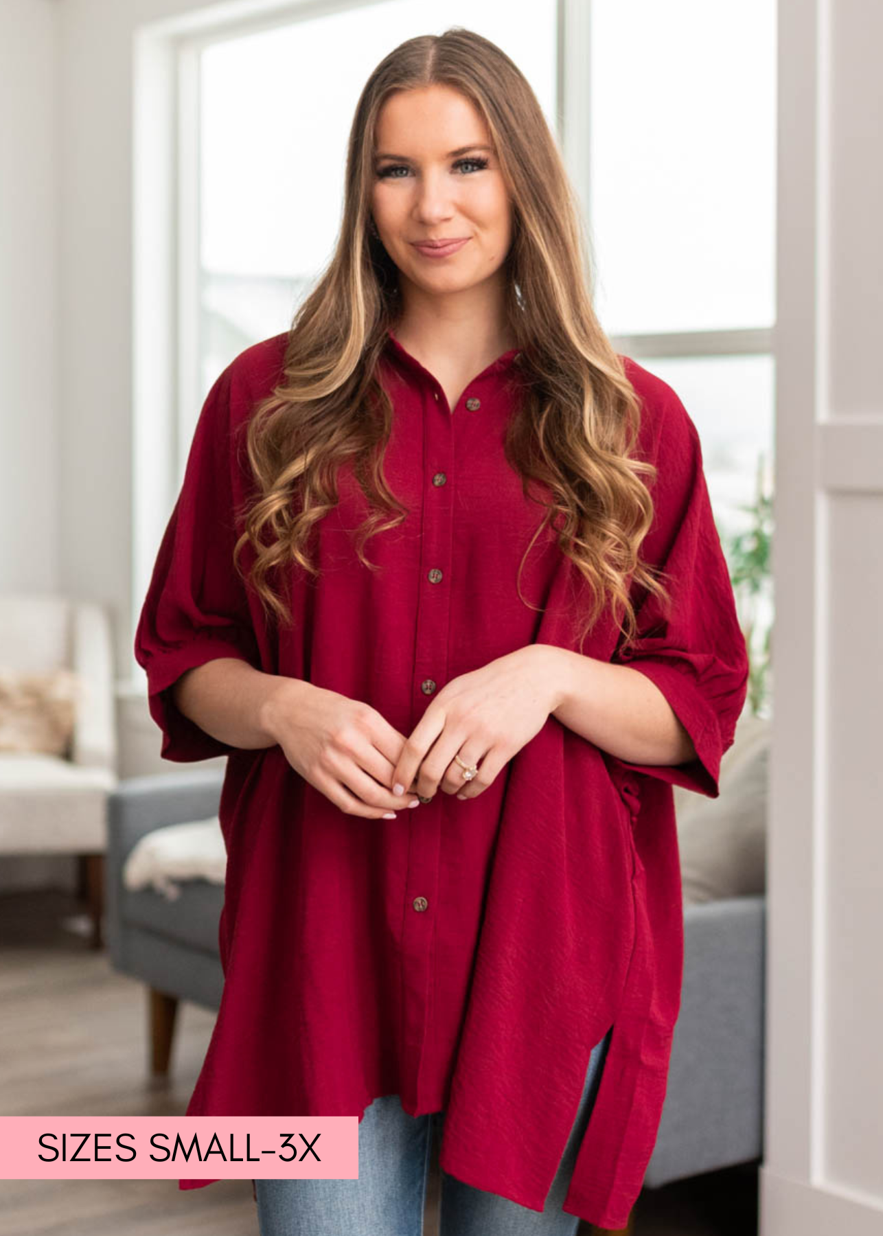 Burgundy button down blouse with a collar and short sleeves