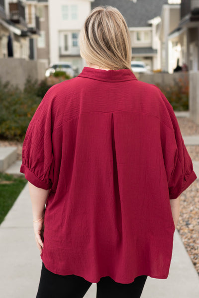 Back view of the plus size burgundy button down