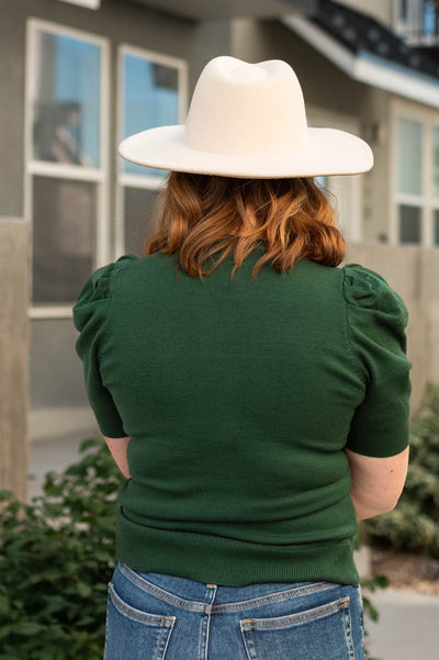 Back view of a dark green top