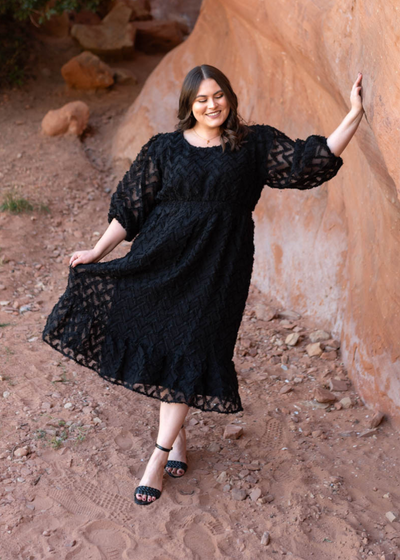 Plus size black dress with 3/4 sleeves