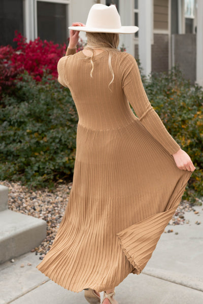 Back view of the latte pleated dress