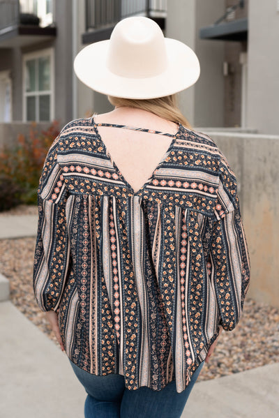 V-neck back detail of the plus size black top