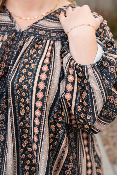 Close up of the patterned fabric on a black top
