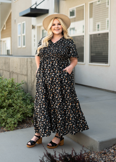 Plus size black floral dress with pockets
