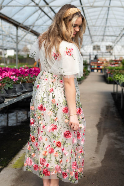 Beautiful floral skirt on the pink embroidered mesh dress