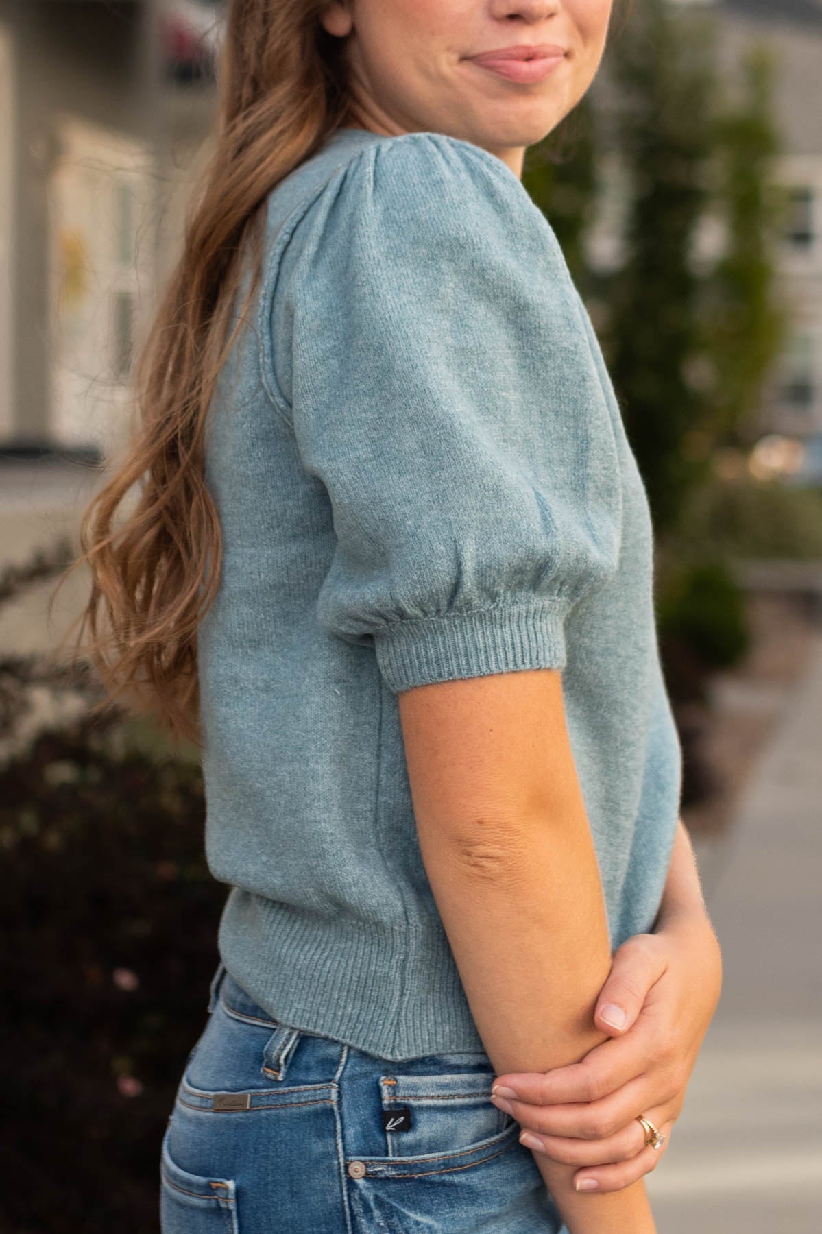 Side view of a blue grey top