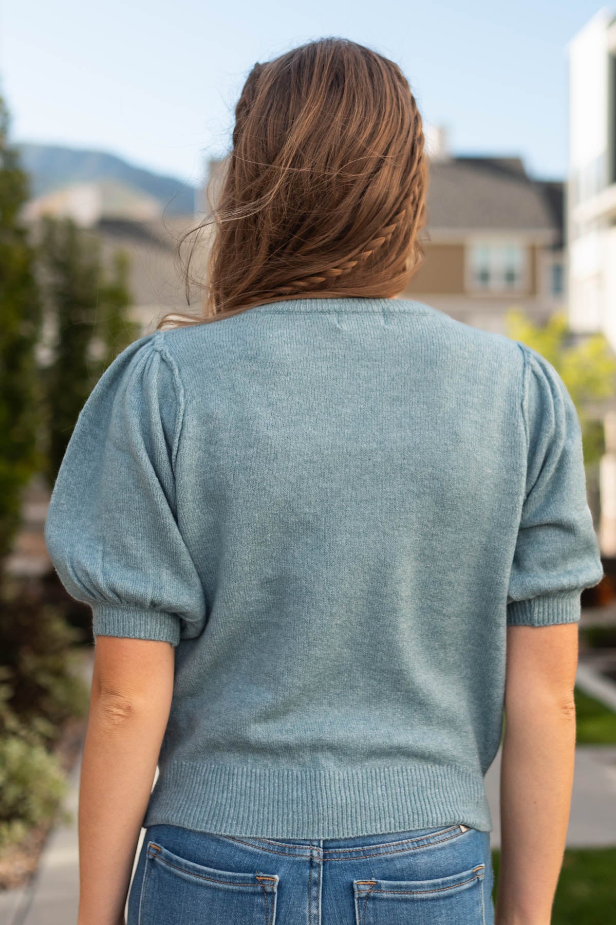 Back view of a blue grey top