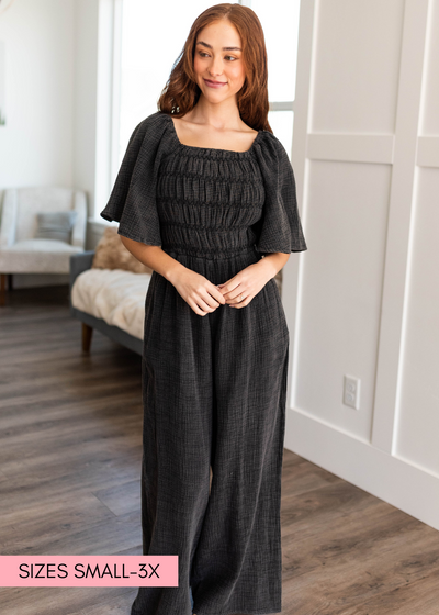 Charcoal wide leg jumpsuit with smocked bodice and short sleeves