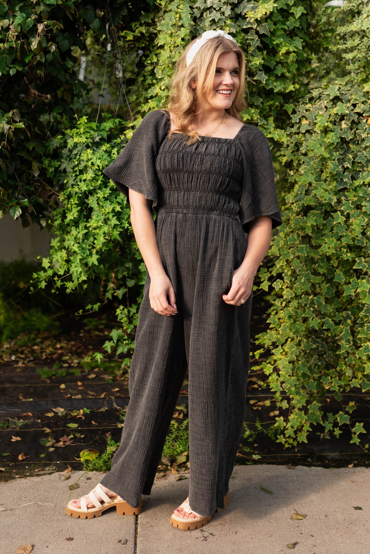 Charcoal wide leg jumpsuit with smocked bodice